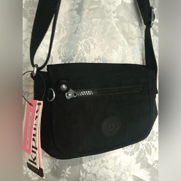 Kipling Sabian Crossbody Mini Bag In Black
Approx. 7.75" W x 5.75" H x 3.25" D - Picture 3 of 7